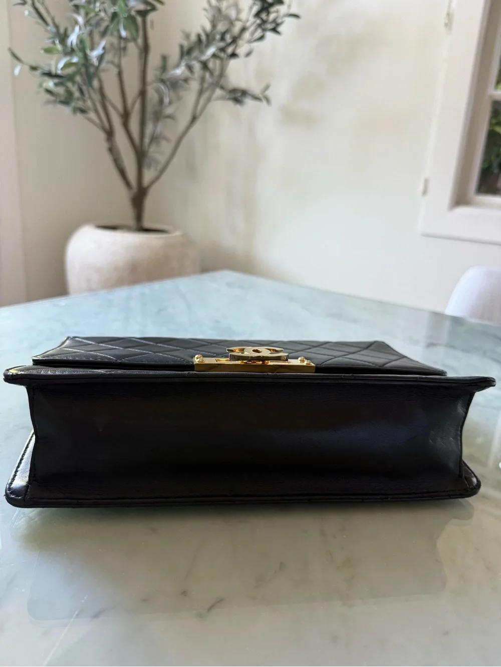 CHANEL Black Quilted Shoulder Bag with Gold Hardware